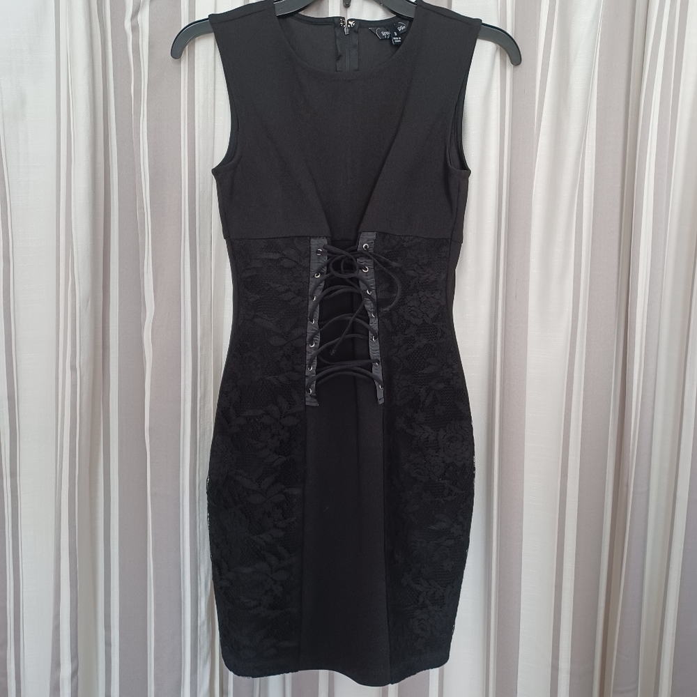 Black mini that laces up in front.